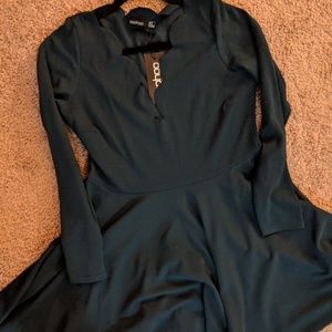 Dark green dress with patterned neckline